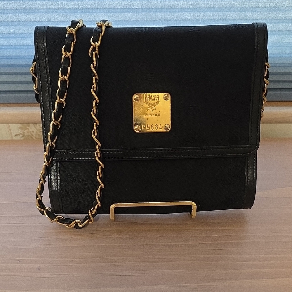 MCM Black Wallet Or Sholder Bag with Gold Accents
